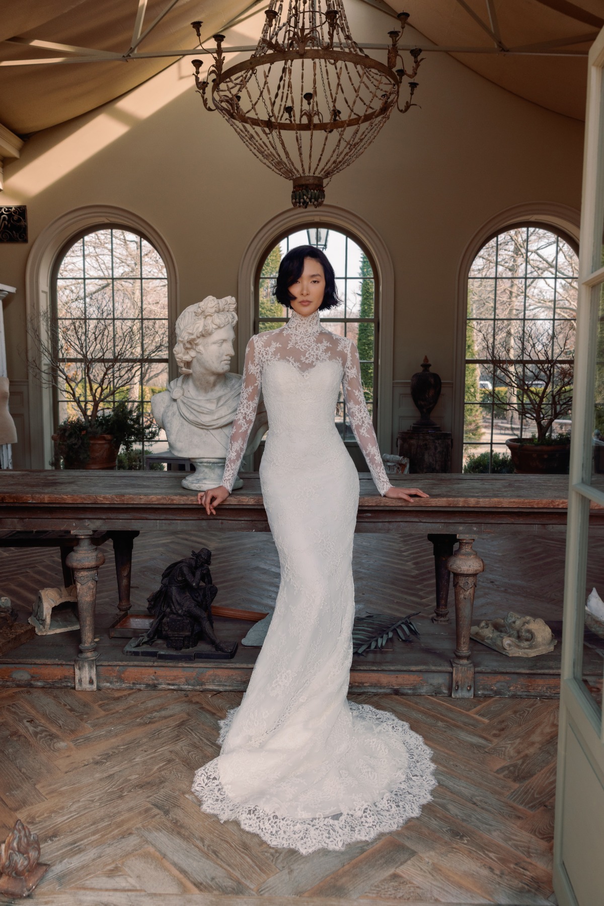 bride wearing sleek lace wedding dress