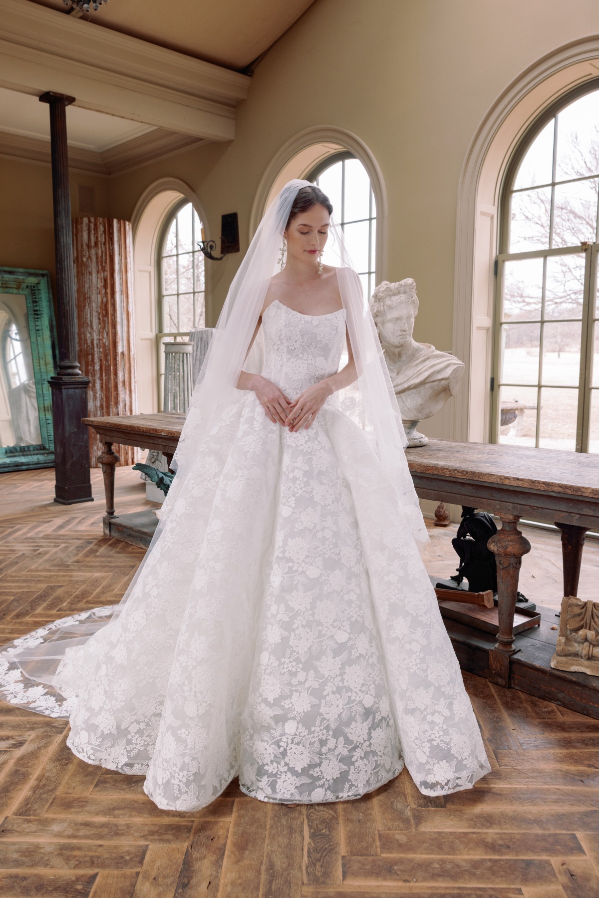 bride wearing lace ballgown cathedral