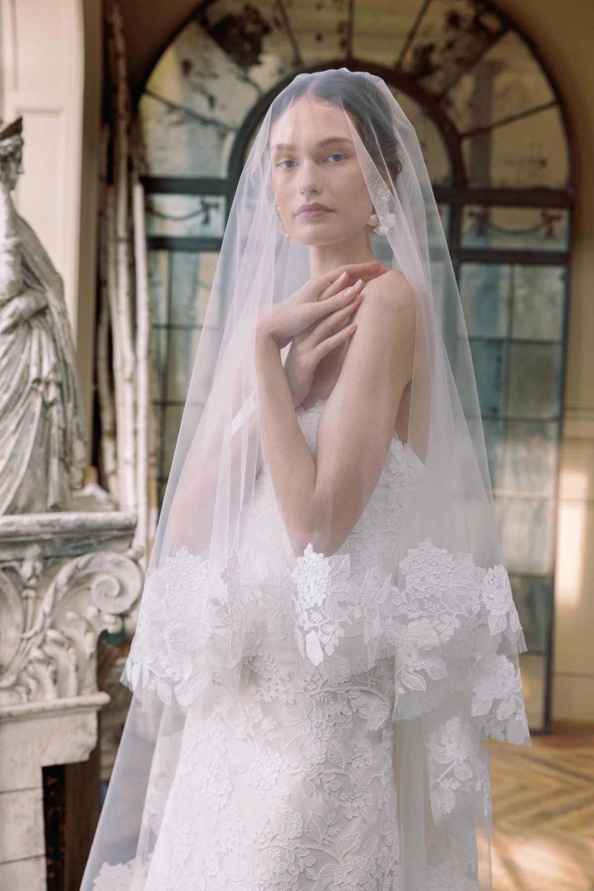bride wearing lace veil
