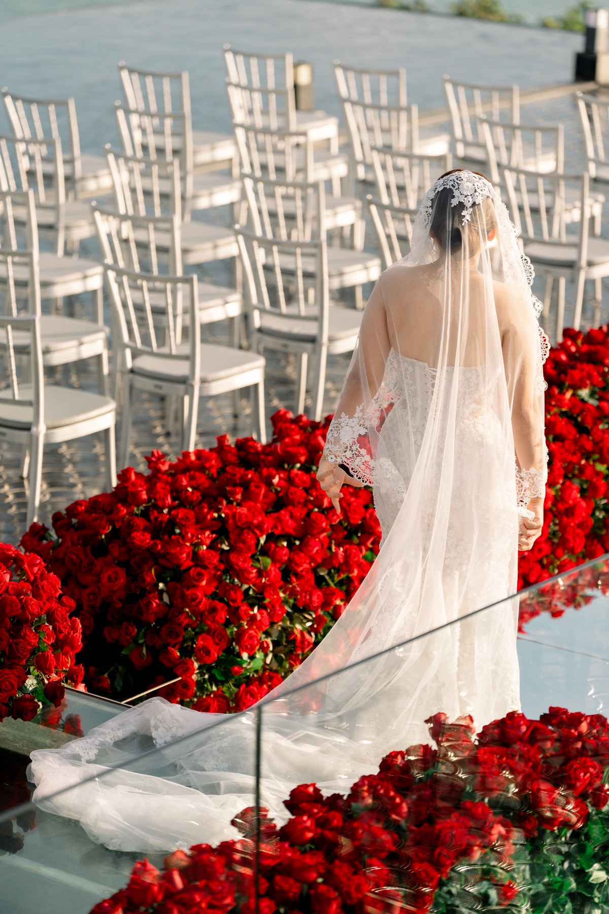 aisle lined with red roses