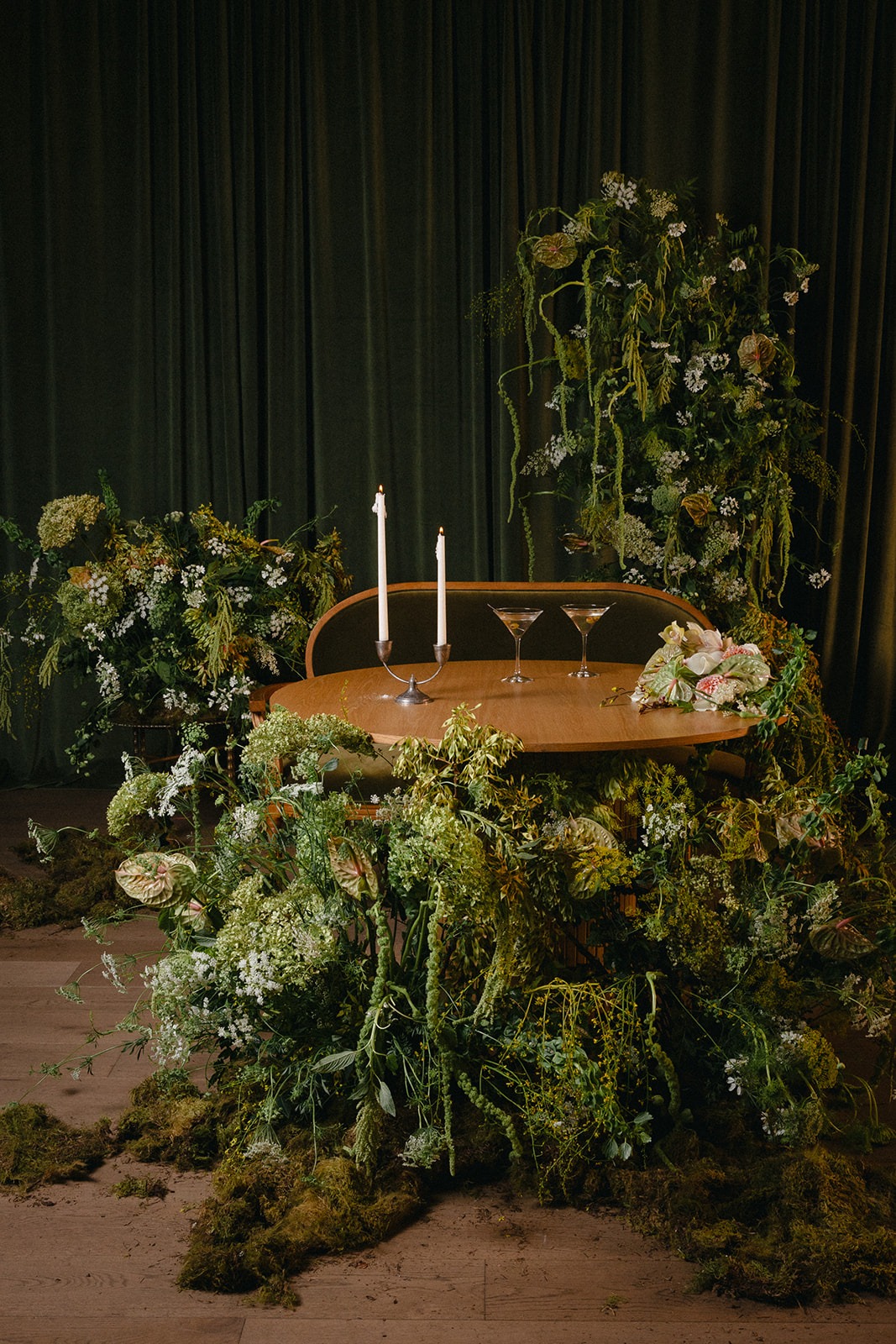 overgrown green wedding sweetheart table ideas