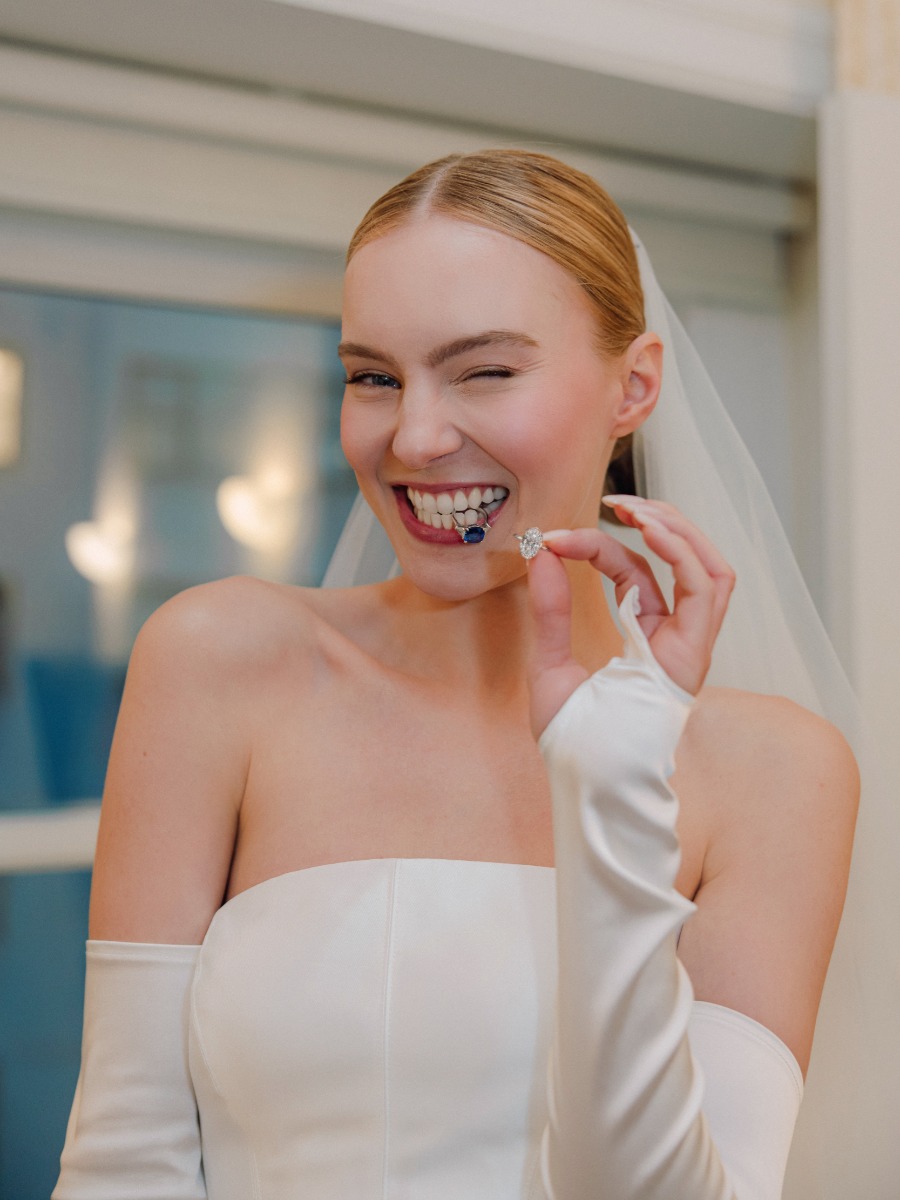 close up photo of bride with rings