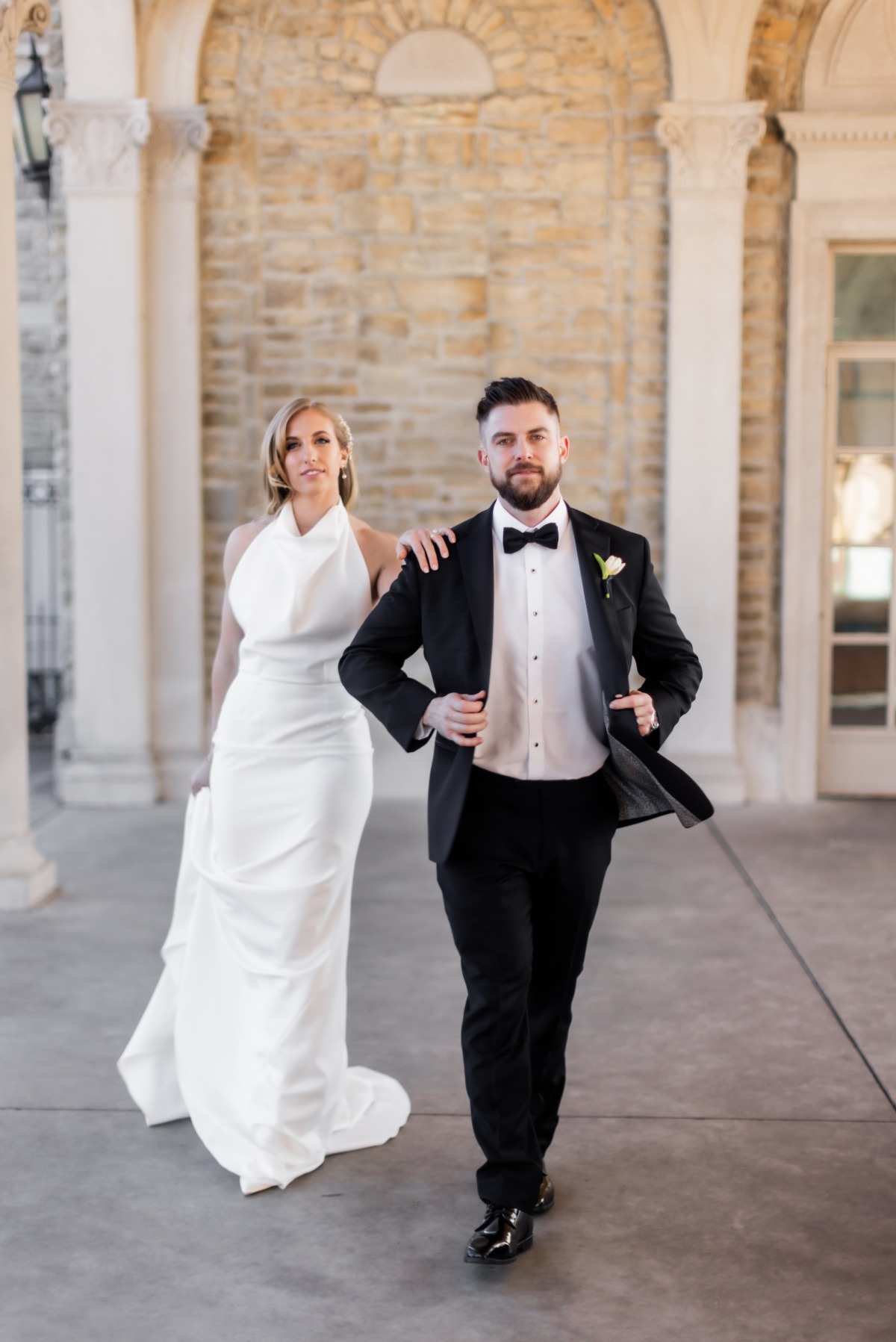 Couple in black tie wedding attire