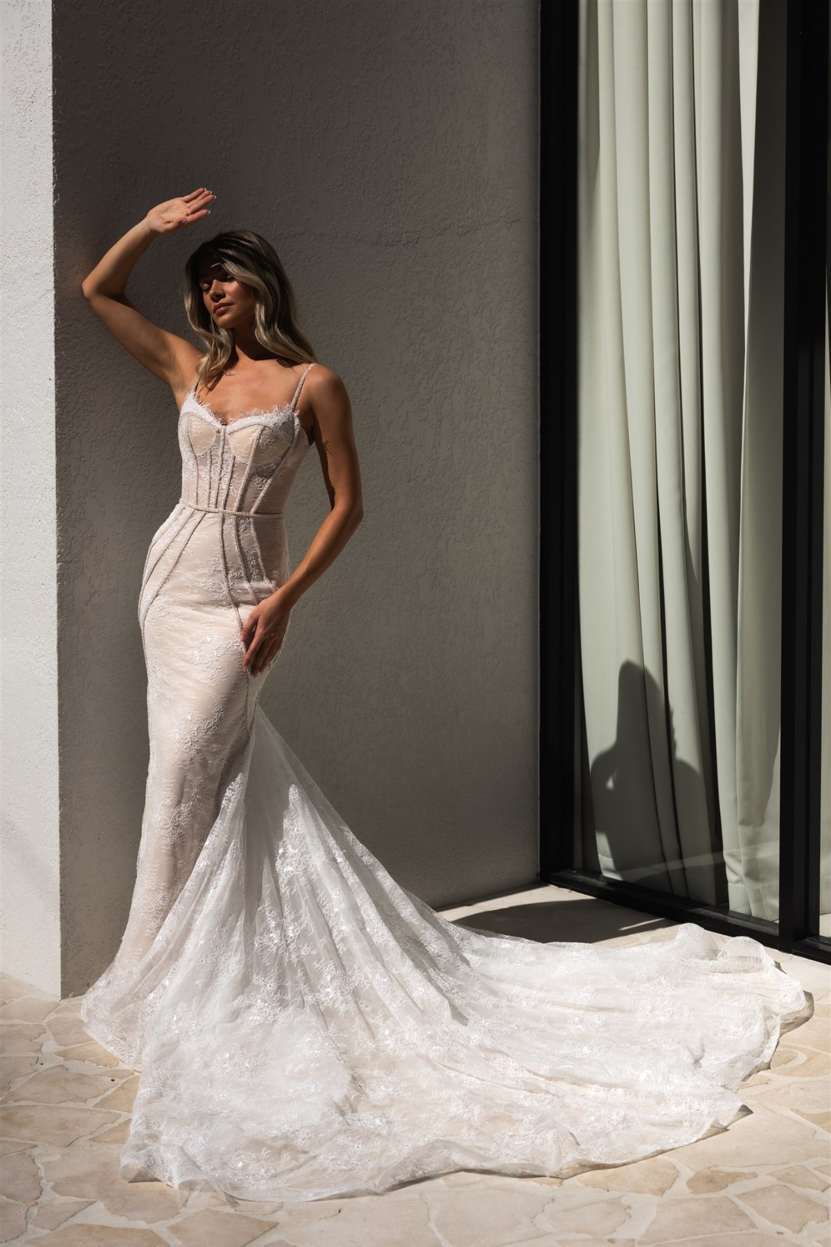 bride outside in shineshine wearing form fitting sparkle dress