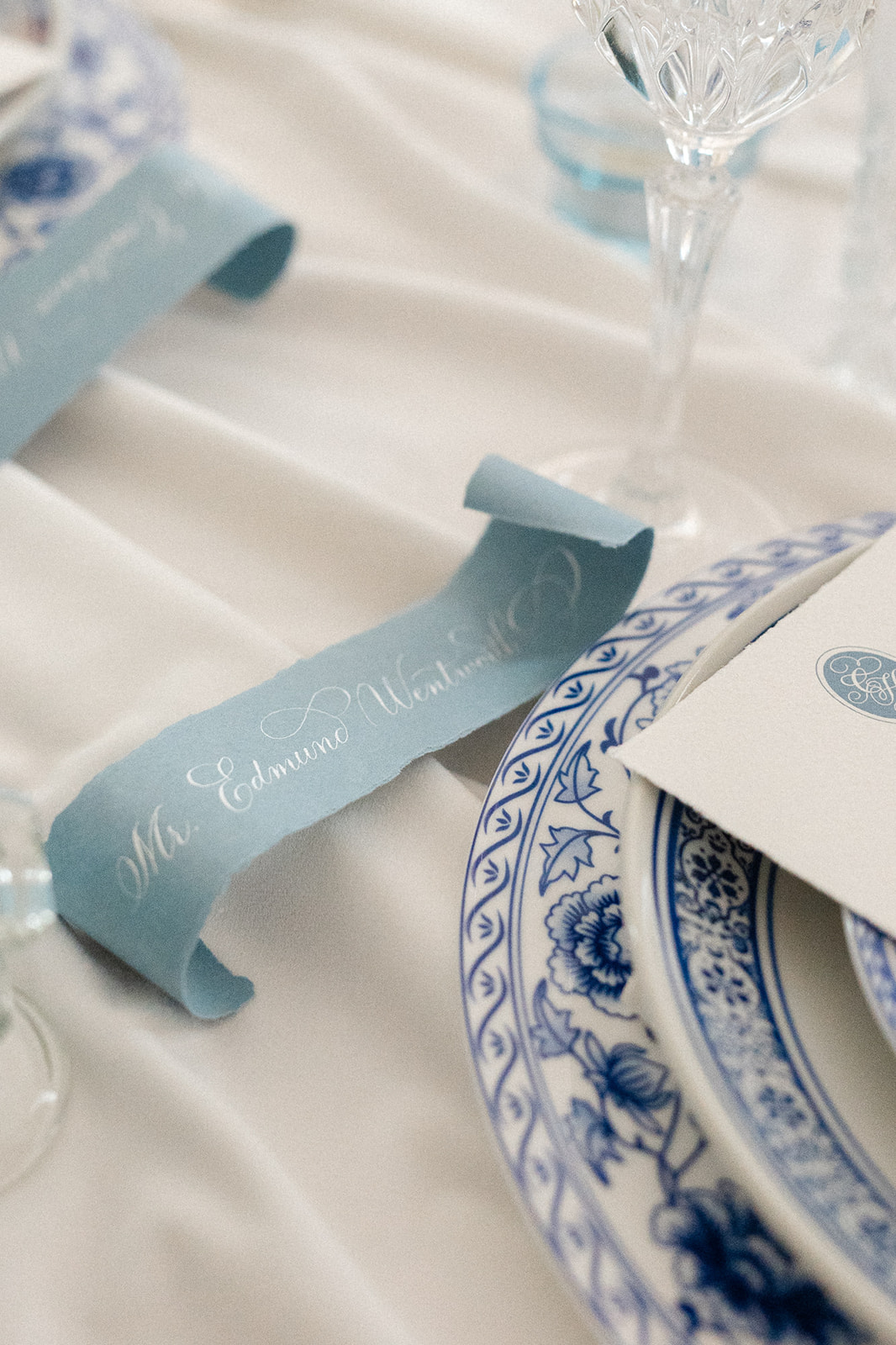 blue name cards with torn edges