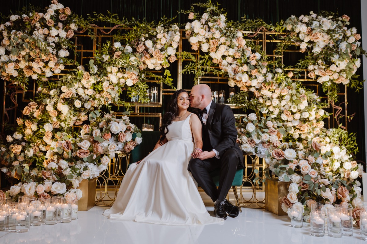 floral arch for sweetheart table at wedding