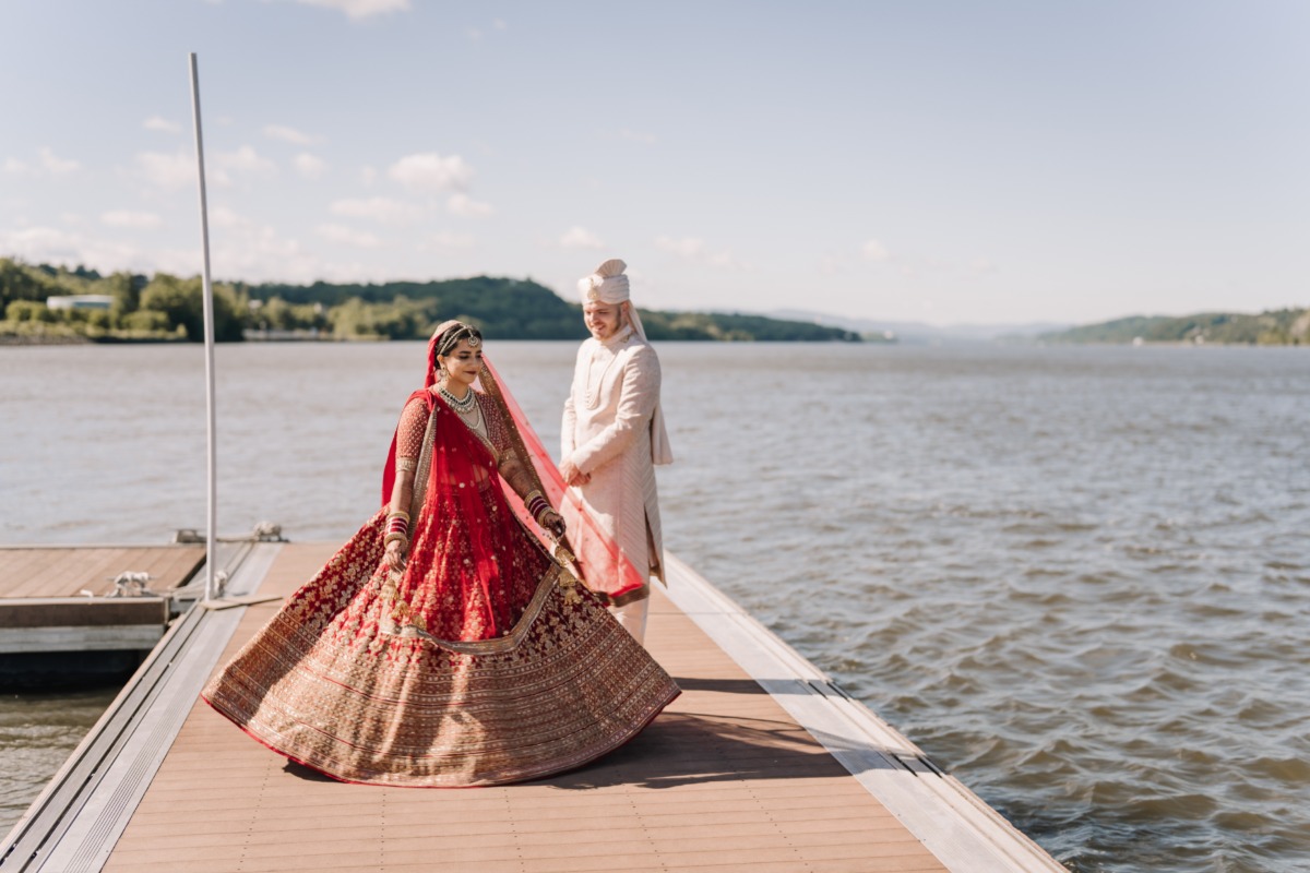 Indian wedding on the hudson in shades of red, orange, and gold