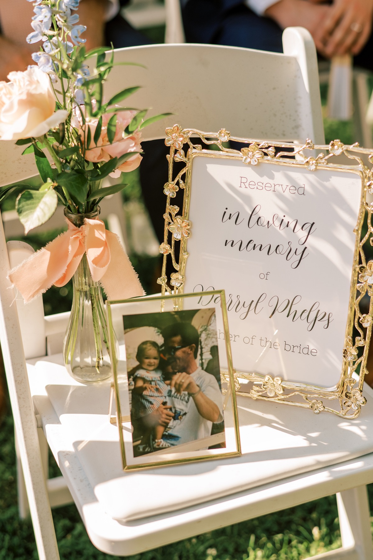 in loving memory chair at wedding ceremony
