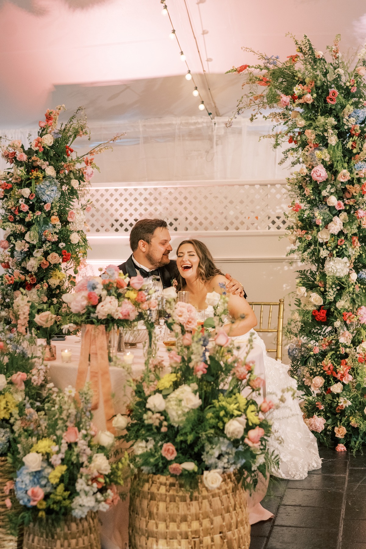 repurposed ceremony flowers for sweetheart table