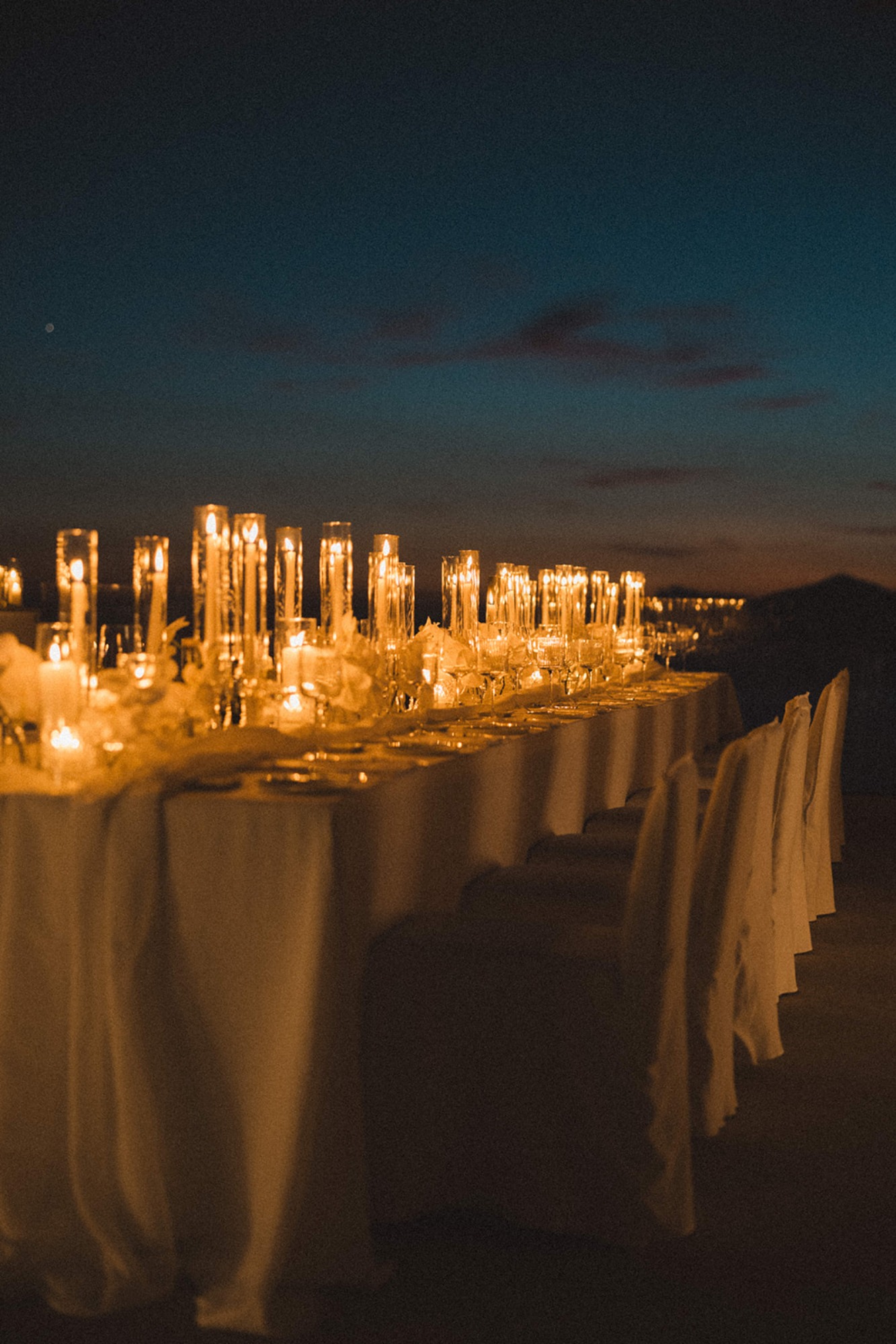 candlelit wedding reception with bride in galia lahav