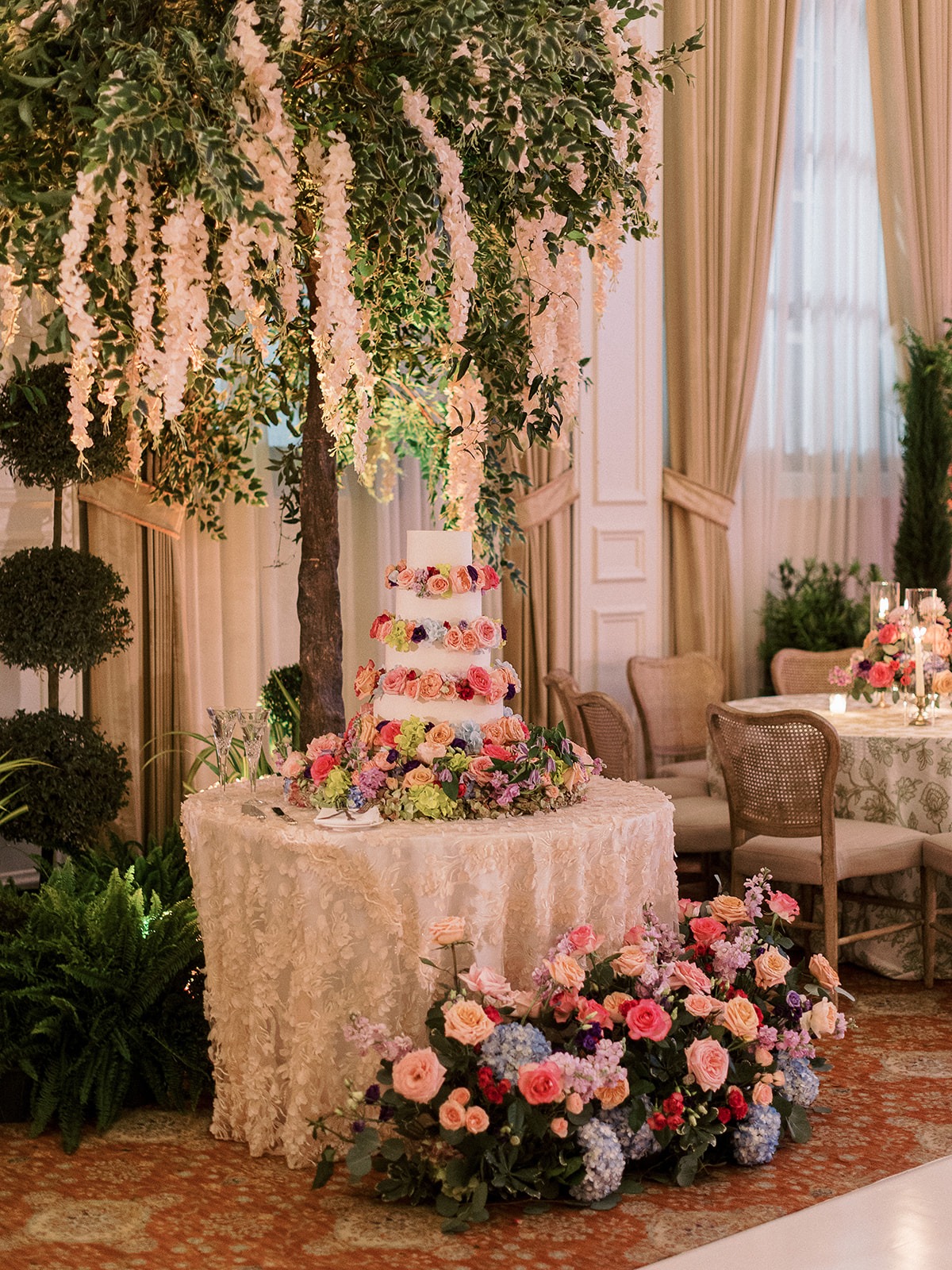 floral cake table with tree decor