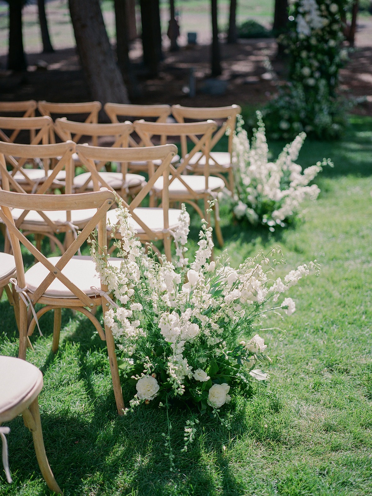 white floral arrangements for wedding ceremony