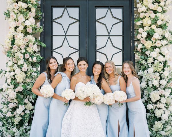 Chic Hill Country Wedding With a Statement Floral Arch at Camp Hosea