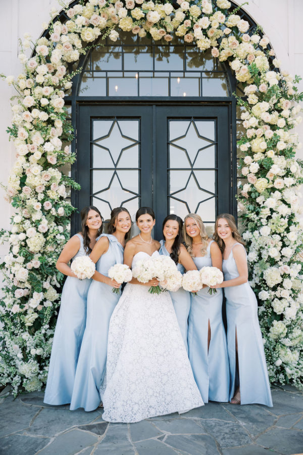 Chic Hill Country Wedding With a Statement Floral Arch at Camp Hosea