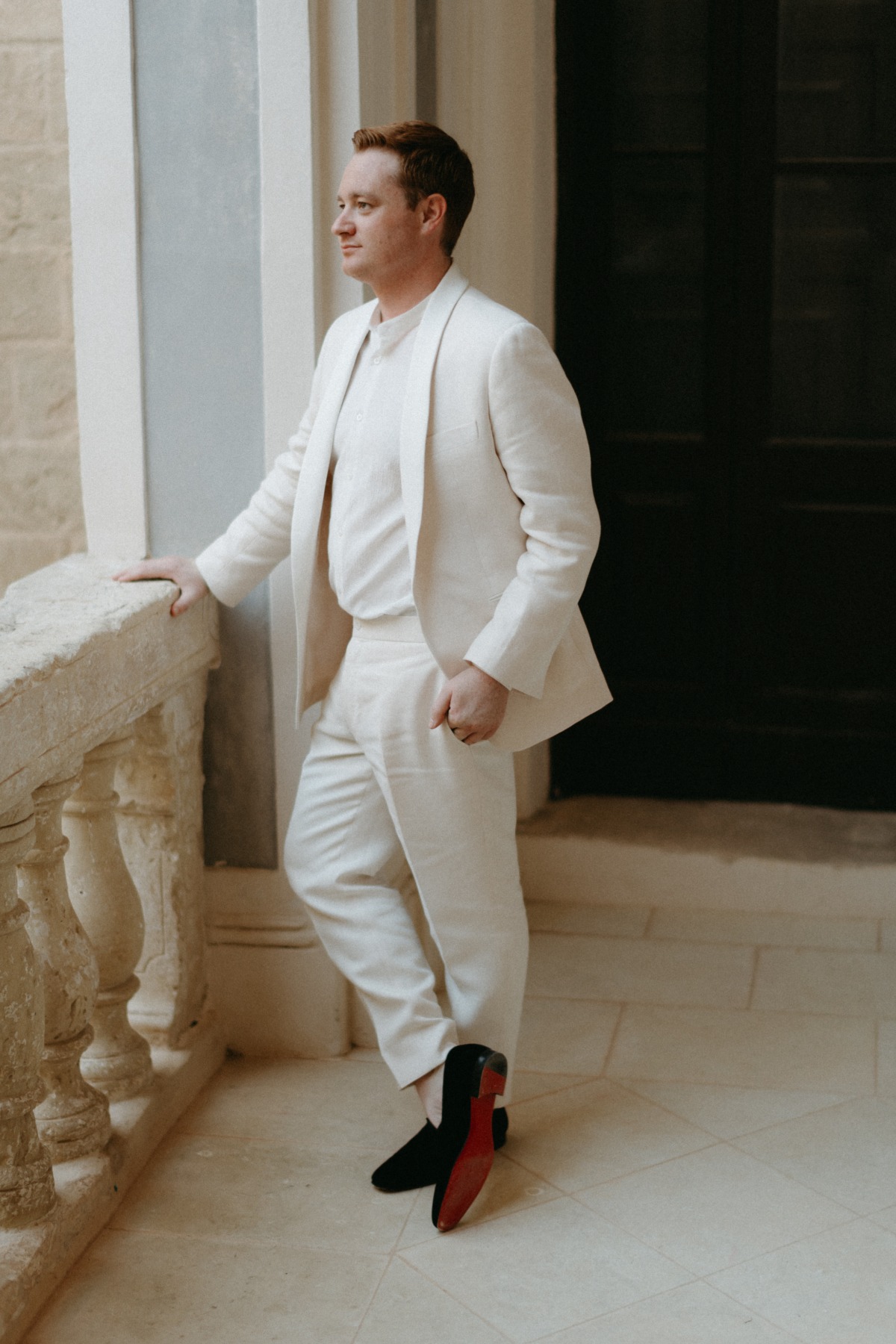 groom in ivory