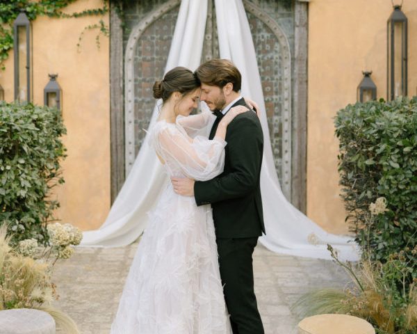 A Mediterranean Wedding in Greece Defined by Sculptural Bows, Dreamy Florals, and Candlelight